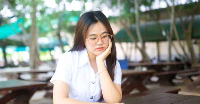 young japanese university student alone