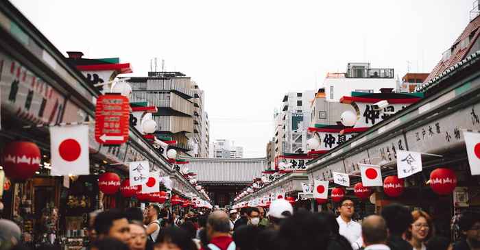 japanese man nervous anxiety crowd street urban