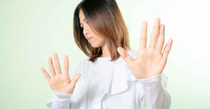 japanese woman suspicious warning caution