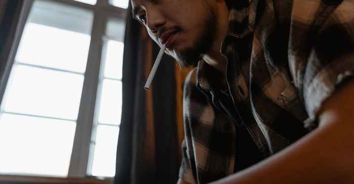 japanese man alone worried window thinking