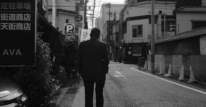 japanese man smiling confident walking outdoor