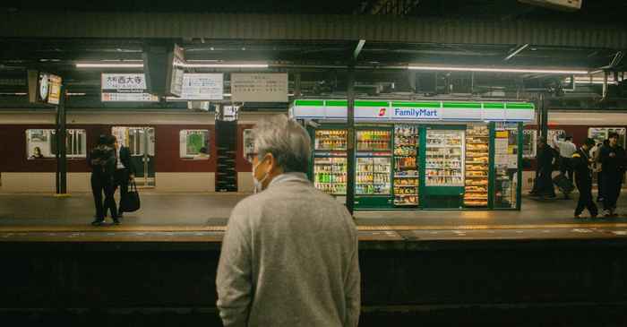 japanese society lonely man isolation modern workplace city