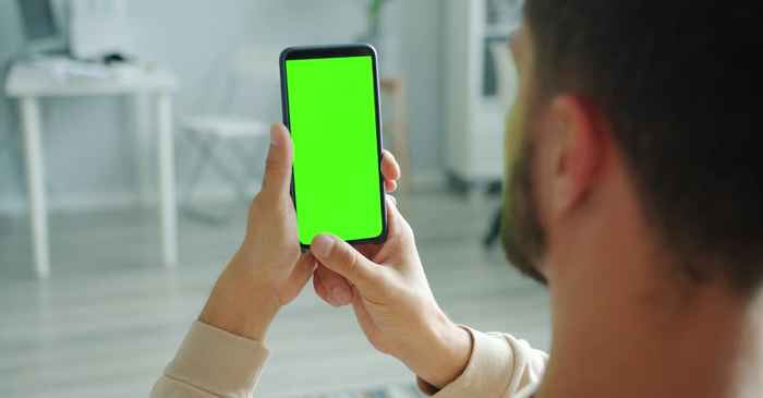 japanese man serious planning steps action phone app