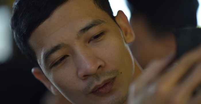 japanese man smartphone thinking serious mature